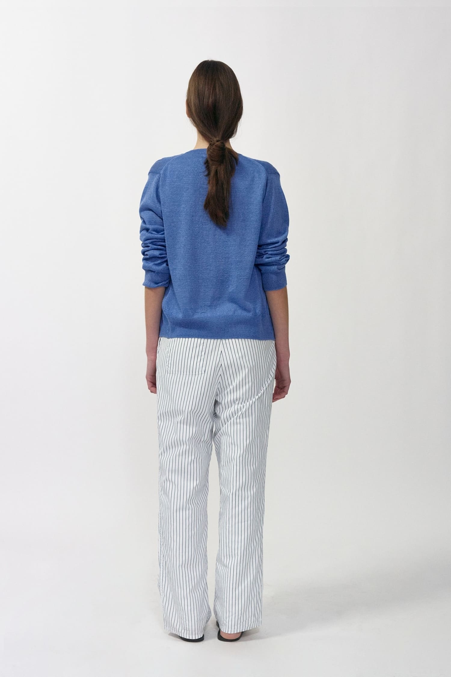 Nothing Written navy stripe cotton pants back view showing elastic waistband and relaxed silhouette