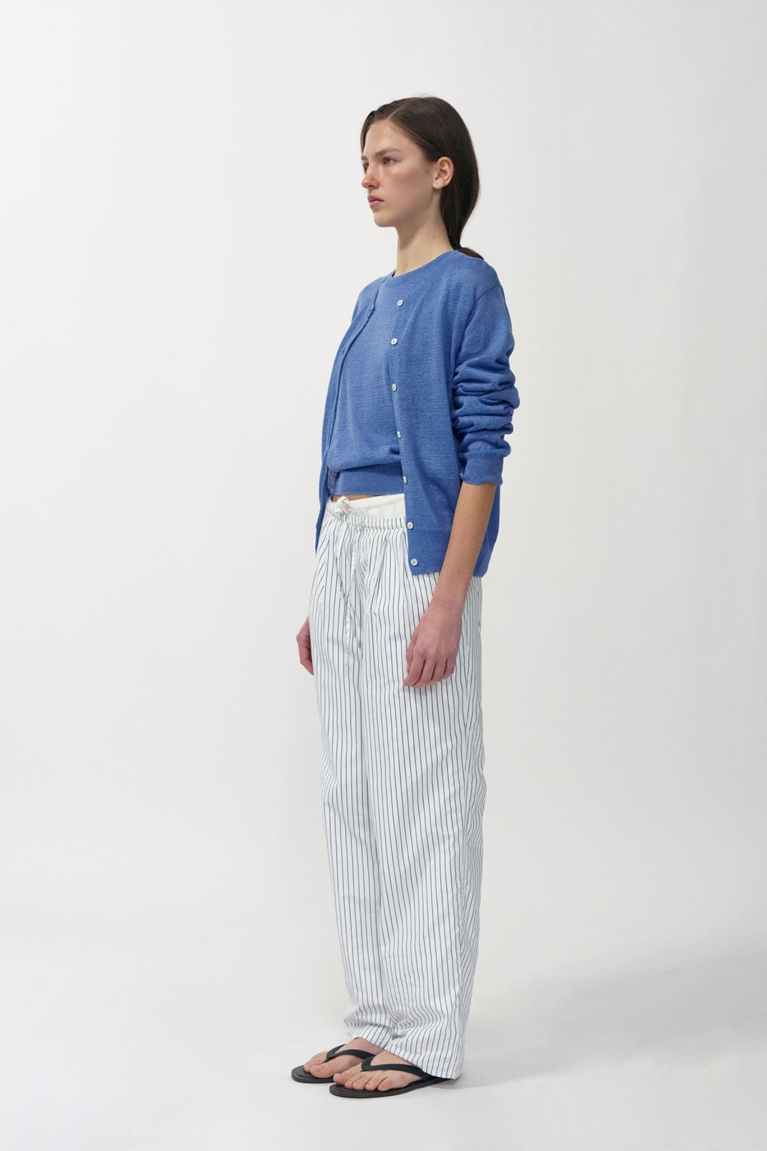 Nothing Written navy stripe cotton pants side view styled with blue cardigan and relaxed fit
