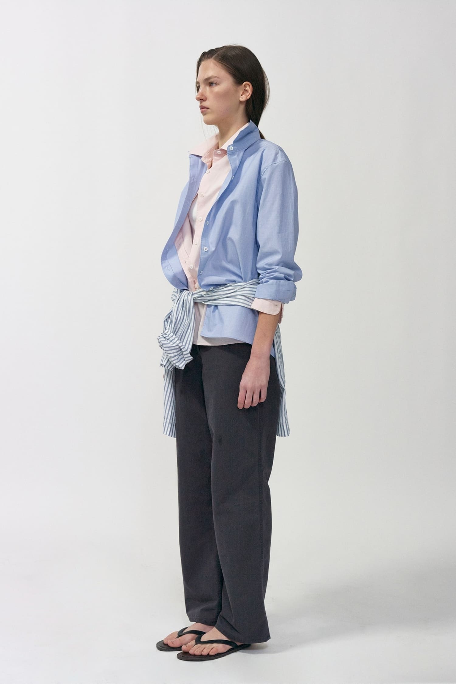 Nothing Written light blue fitted cotton shirt worn side view with tailored silhouette