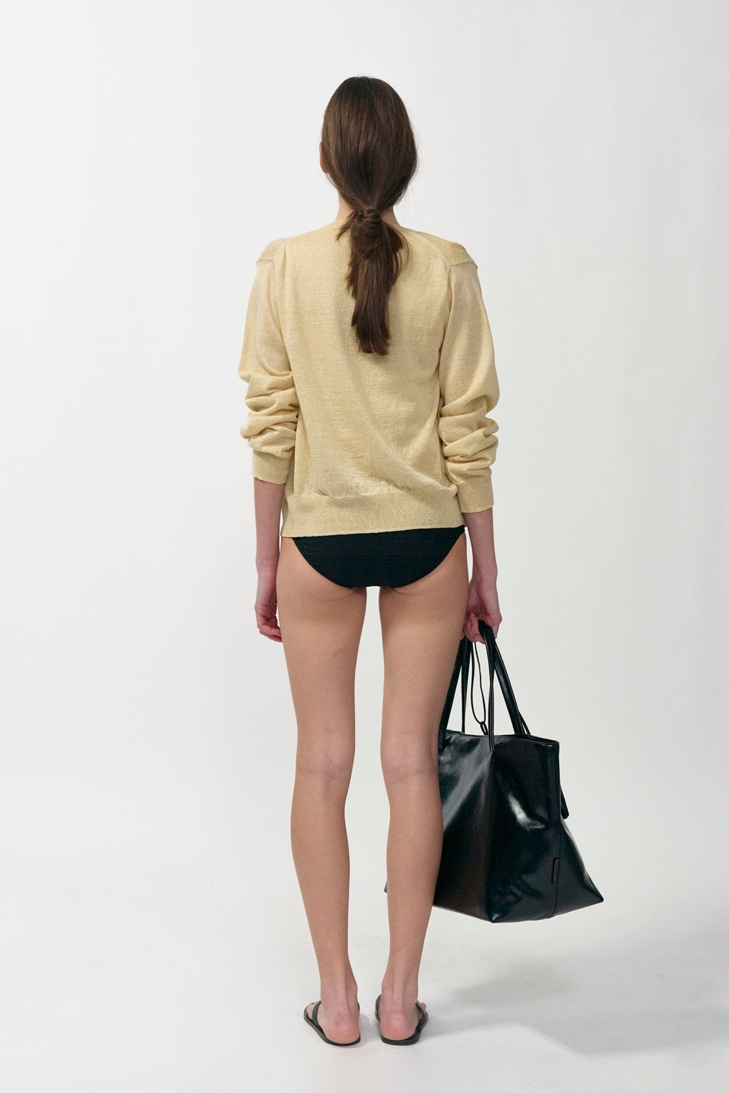 Nothing Written yellow linen cardigan worn back view