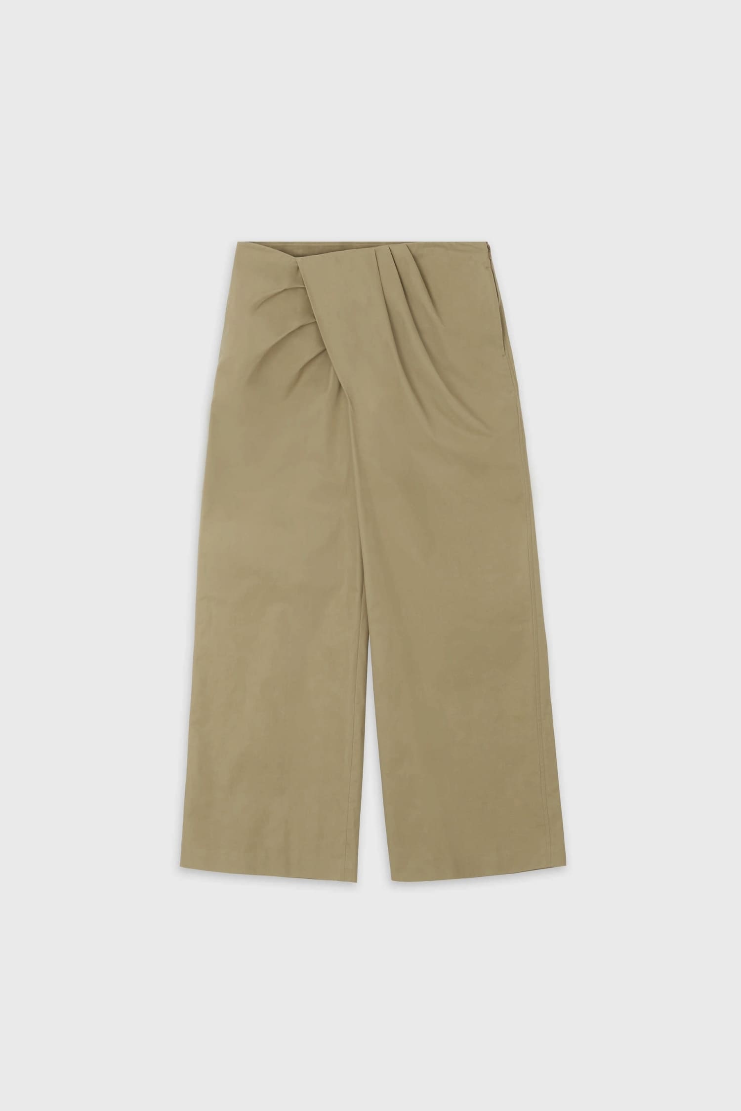 The Loom beige asymmetrical wrap trousers flat lay front view with pleated wrap detail | hover