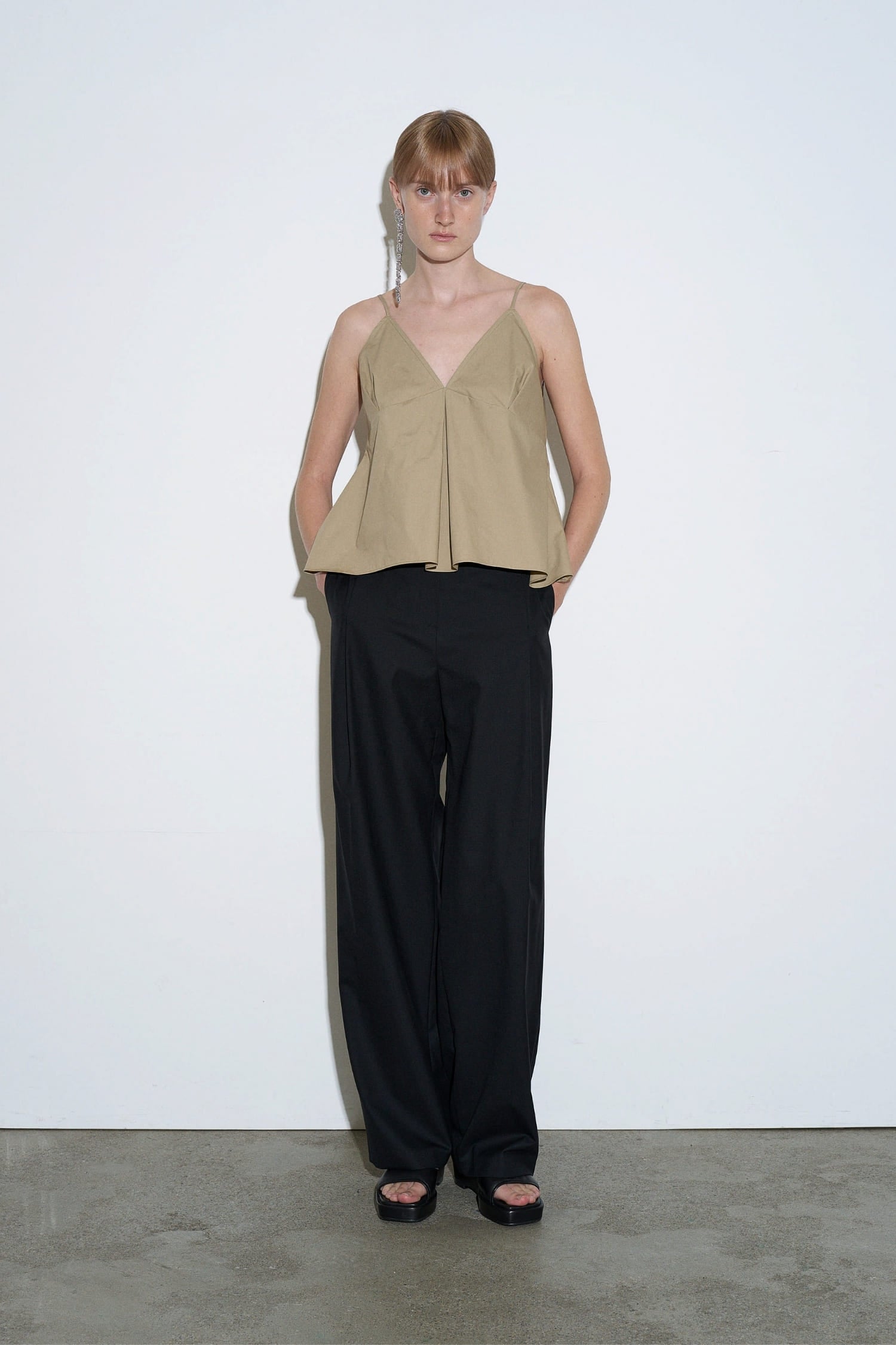The Loom beige cotton pleated camisole front view with V neckline and relaxed silhouette | hover