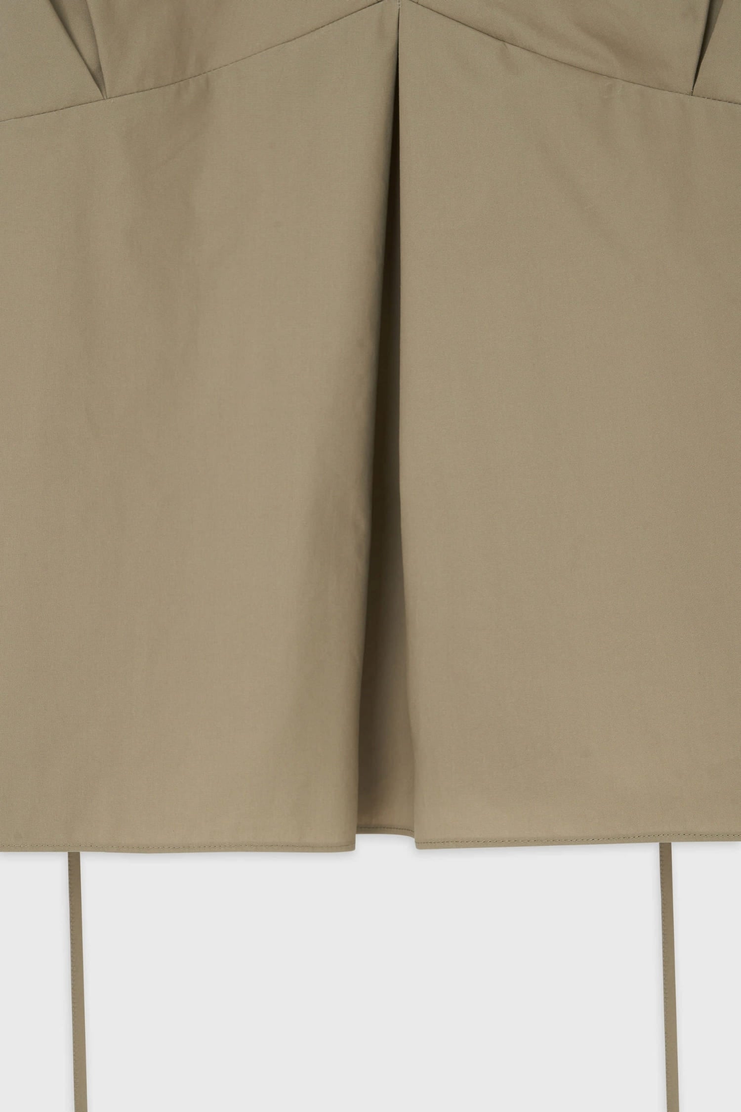 Close-up of front pleat detail on The Loom beige cotton camisole